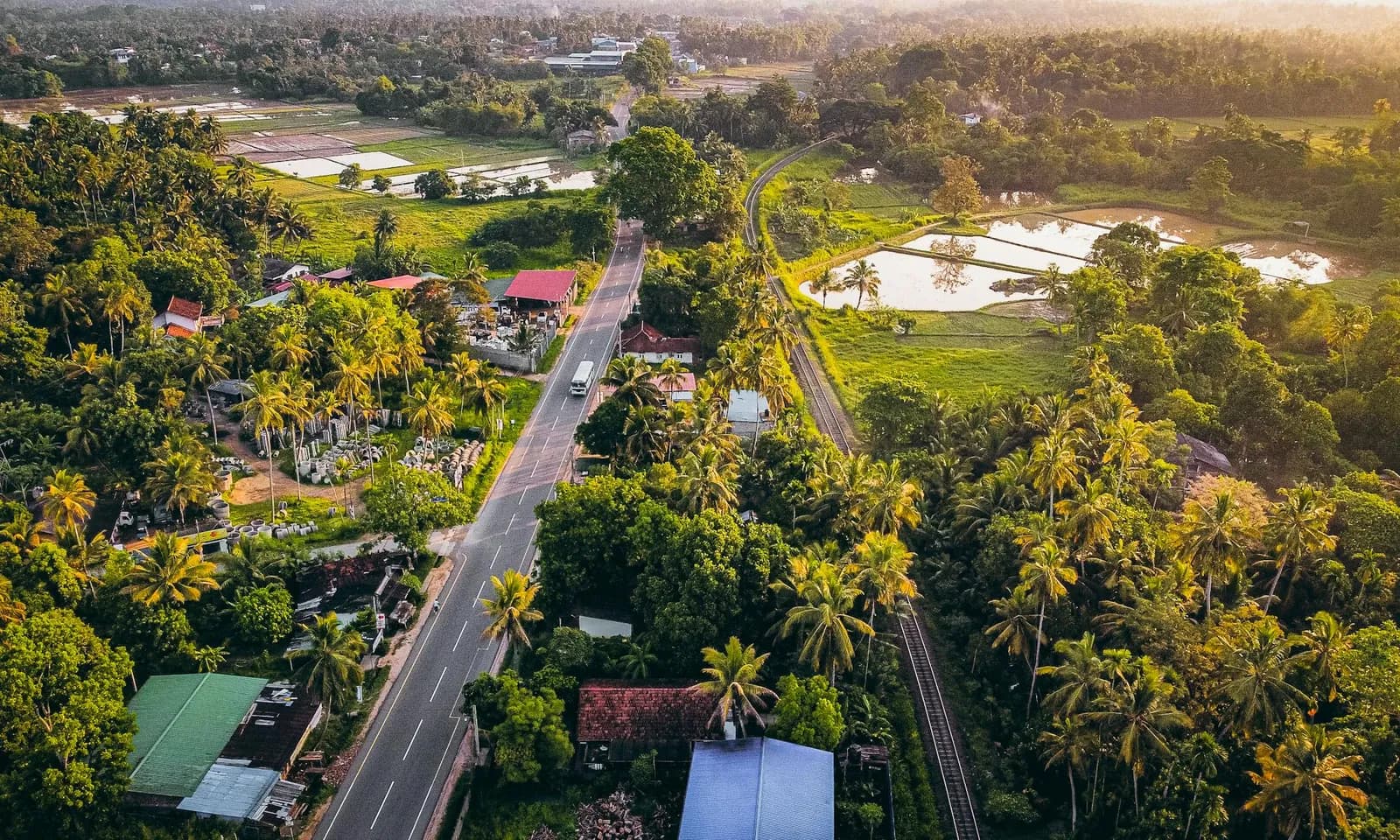 Road and rail corridor representing long north-south overland travel.